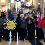 Individuals posing for a group photo at Union station